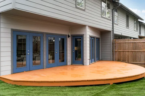 a view of swimming pool with a lounge chair