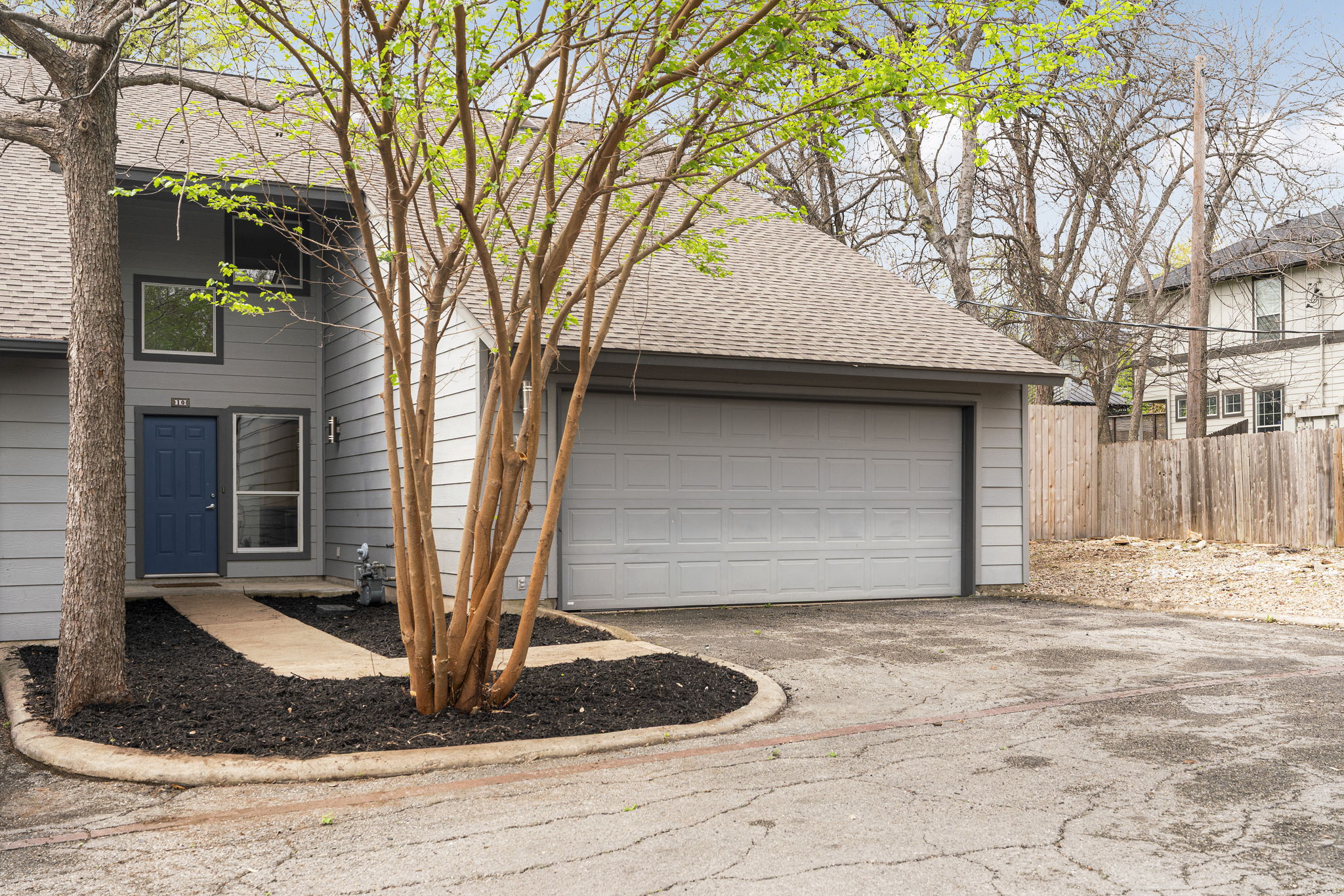 2114 Goodrich Avenue, Unit 10 Austin, TX 78704 - Photo 4 of 35 A highly sought-after feature in Zilker, the attached two-car garage offers everyday convenience and secure lock-and-leave living in the heart of 78704.