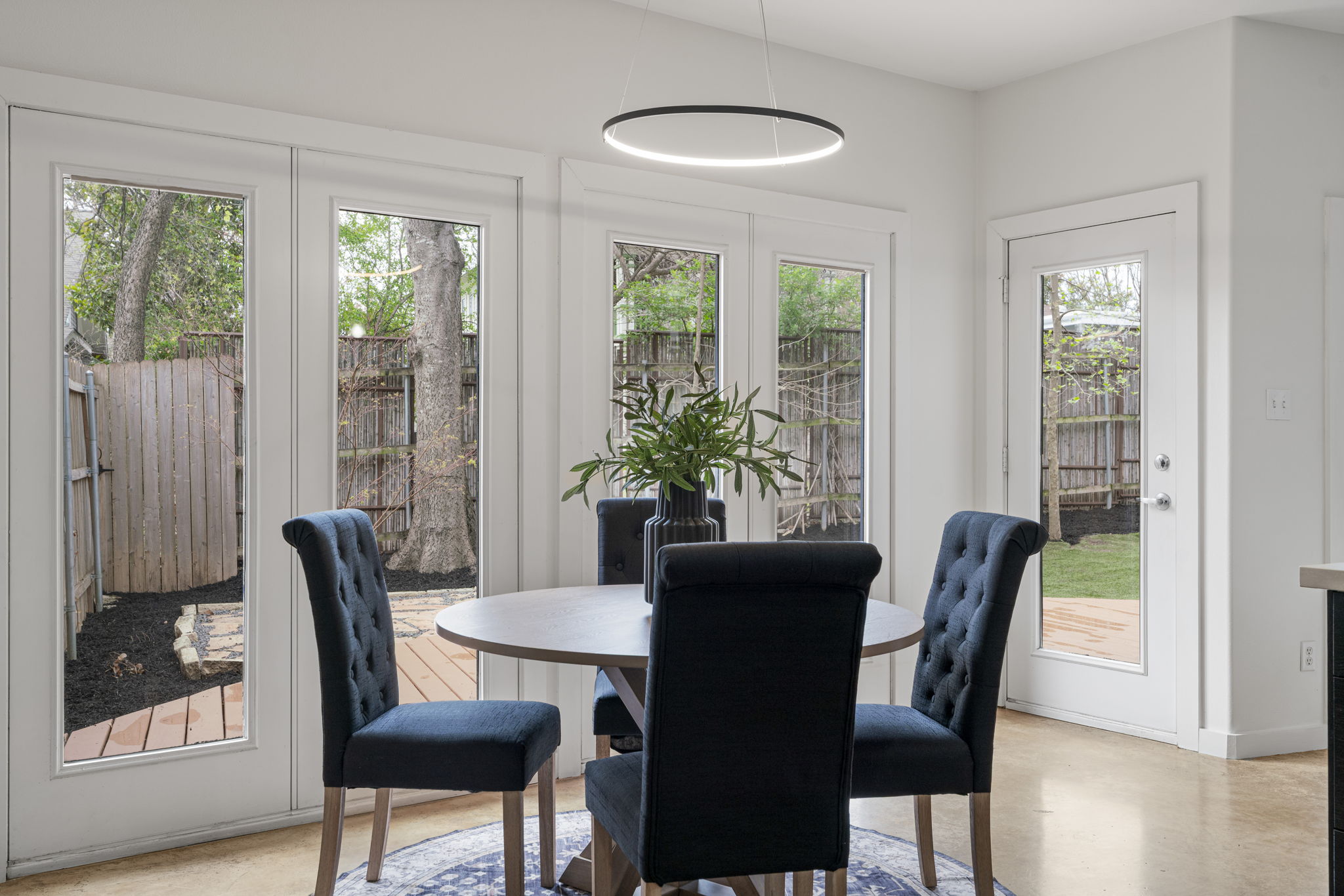 2114 Goodrich Avenue, Unit 10 Austin, TX 78704 - Photo 7 of 35 A dedicated dining space provides the perfect setting for gathering with friends before a night out in 78704.