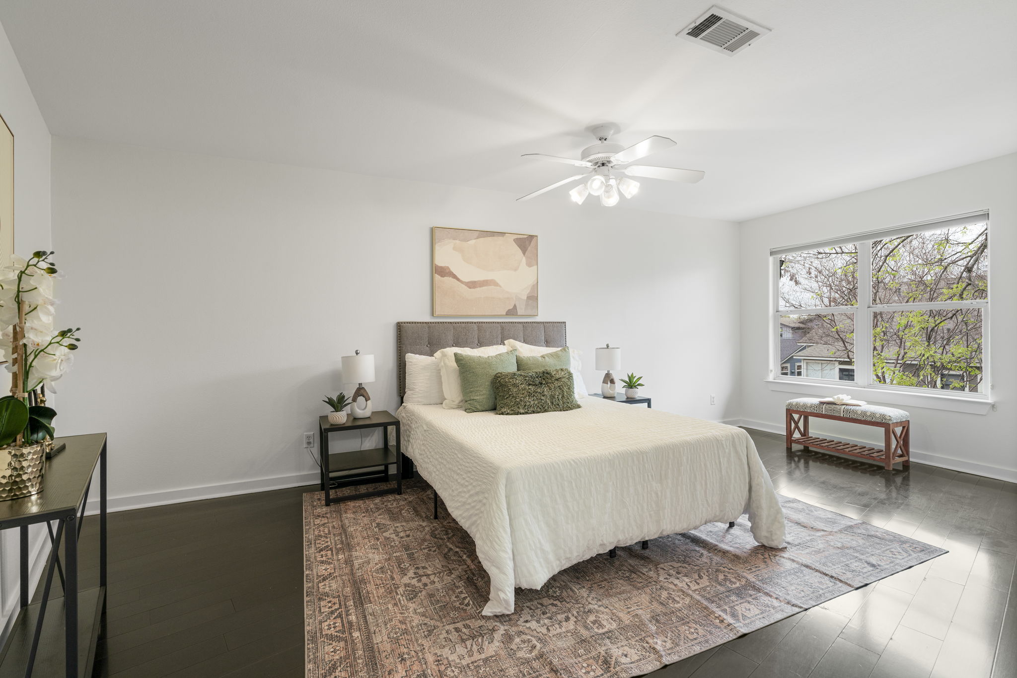 2114 Goodrich Avenue, Unit 10 Austin, TX 78704 - Photo 8 of 35 The spacious primary suite features generous proportions and abundant natural light.