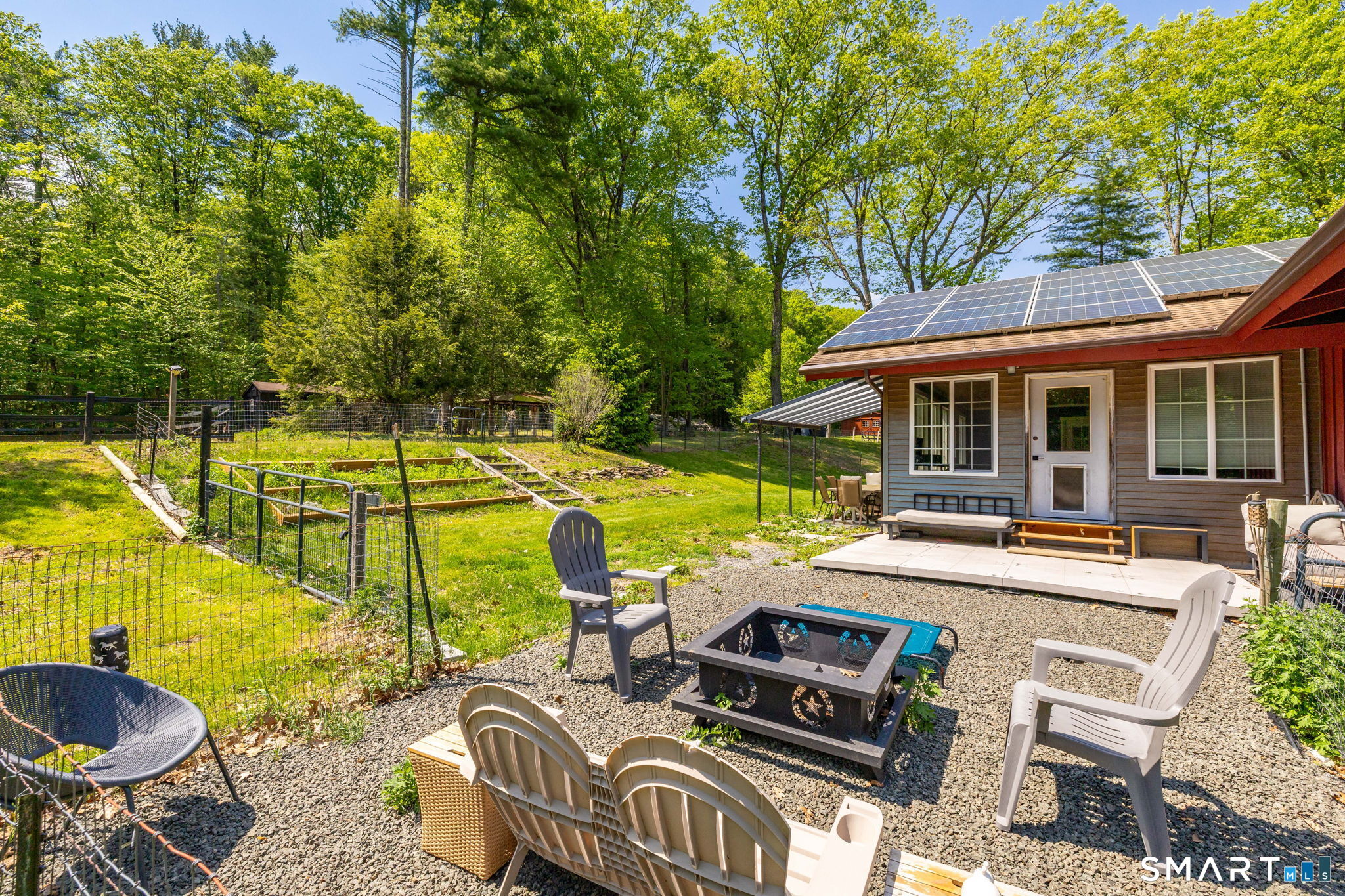 250 Center Hill Road Barkhamsted, CT 06063 - Photo 29 of 40 a view of a house with backyard and swimming pool
