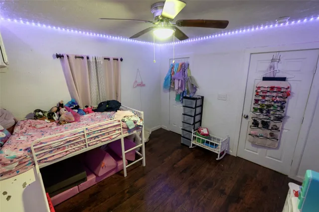 a bed room with a bed and a walk in closet