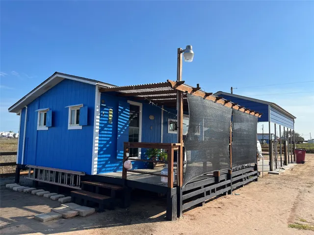 a front view of a house with parking space