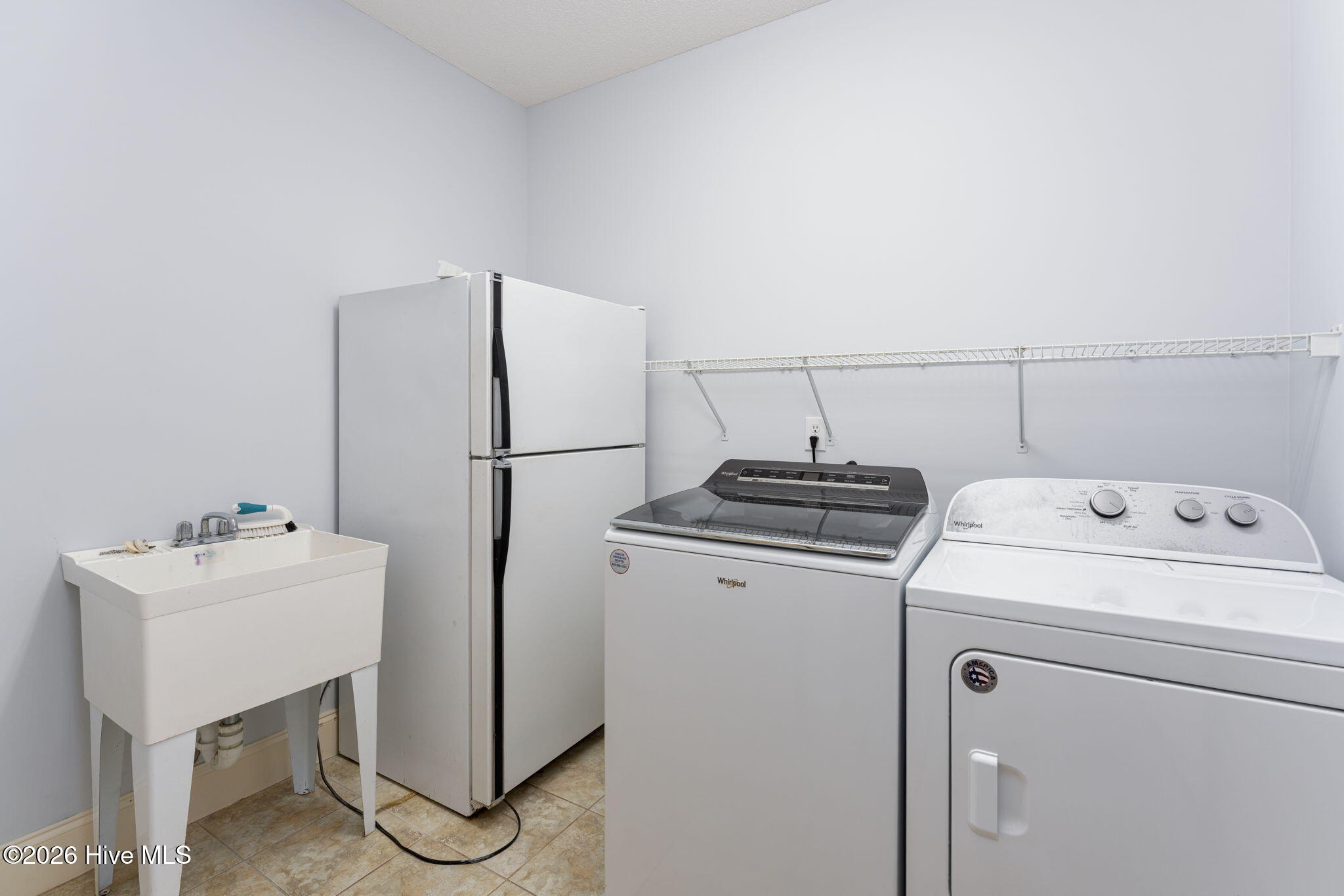 2689 Sloop Point Loop Road Hampstead, NC 28443 - Photo 51 of 112 laundry-01a