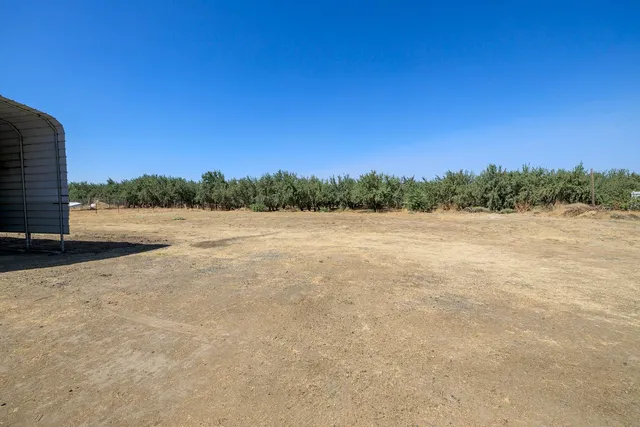 a front view of a house with swimming pool