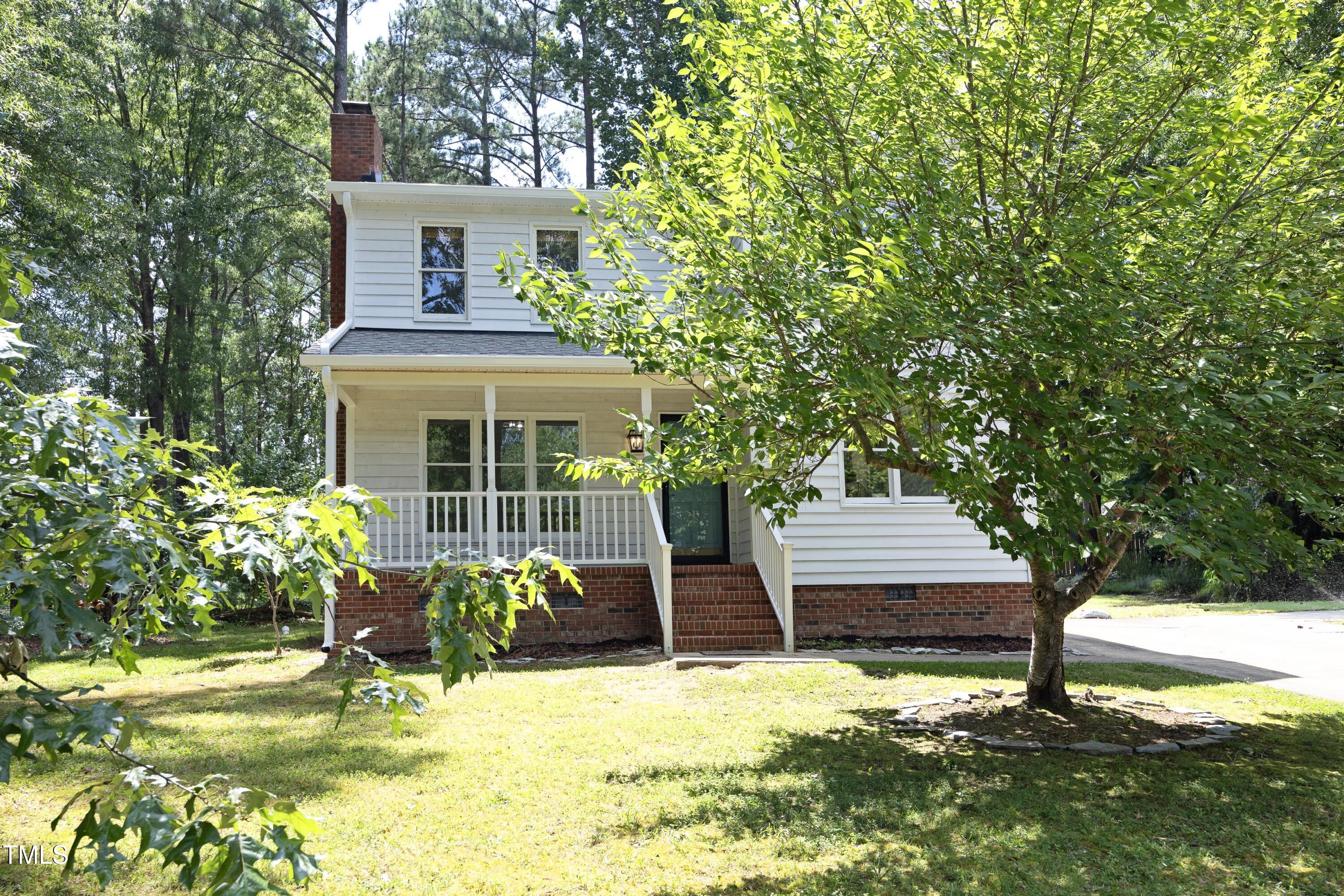 409 Glaive Drive Durham, NC 27703 - Photo 2 of 35 front view of a house with a yard