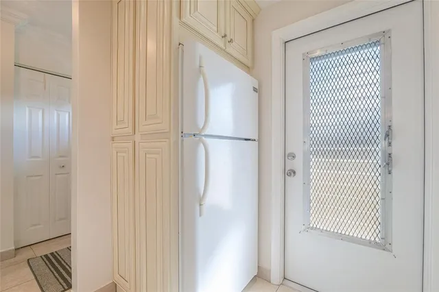 a bathroom with a granite countertop sink a toilet a shower and a mirror