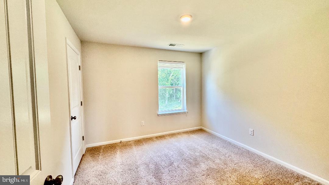 1236 Pimpernell Path Middletown, DE 19709 - Photo 16 of 37 a view of an empty room with a window