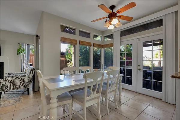 a view of kitchen with cabinets and furniture