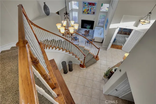 a bedroom with a bed and a desk