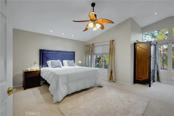 a bathroom with a bathtub and window