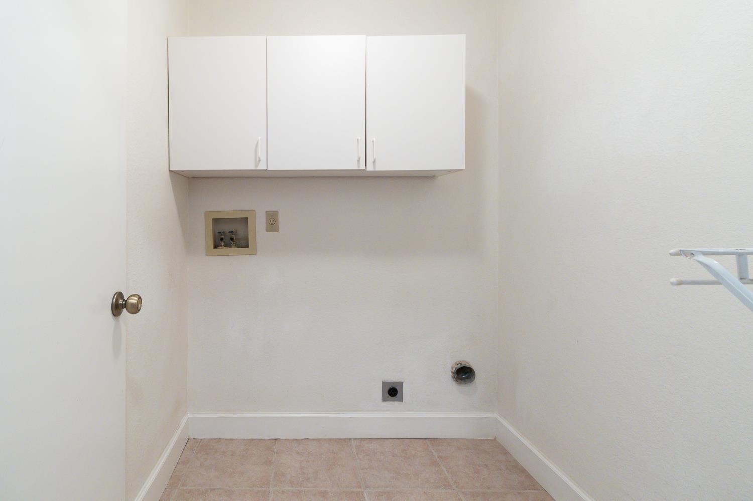 4209 Godfrey Drive Salida, CA 95368 - Photo 19 of 34 a view of small space with racks on the wall
