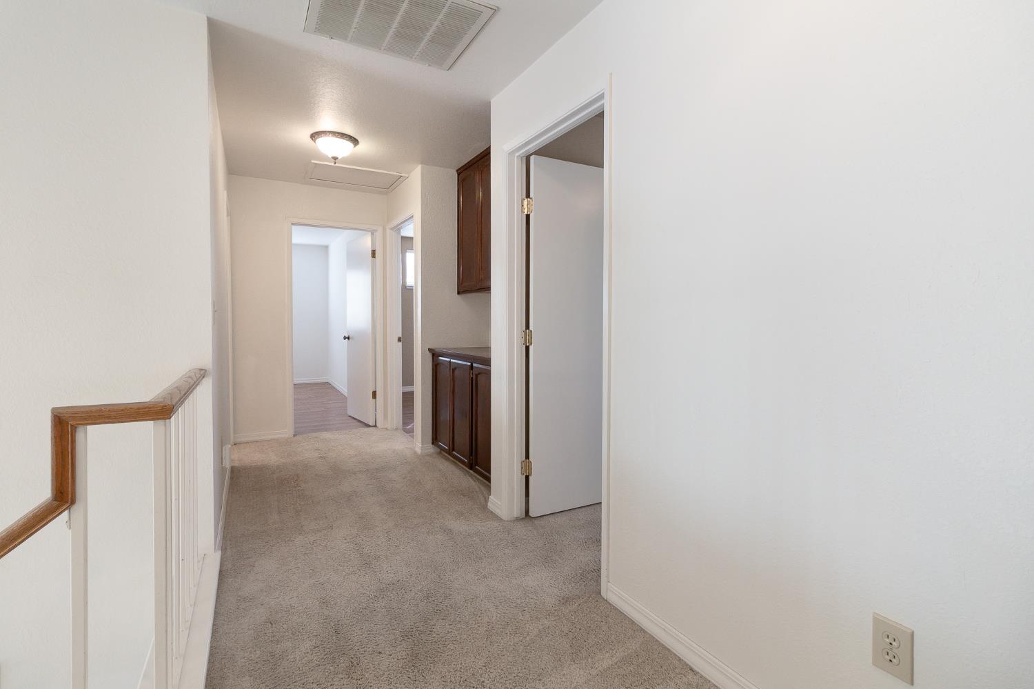 4209 Godfrey Drive Salida, CA 95368 - Photo 26 of 34 a view of a hallway with closet area