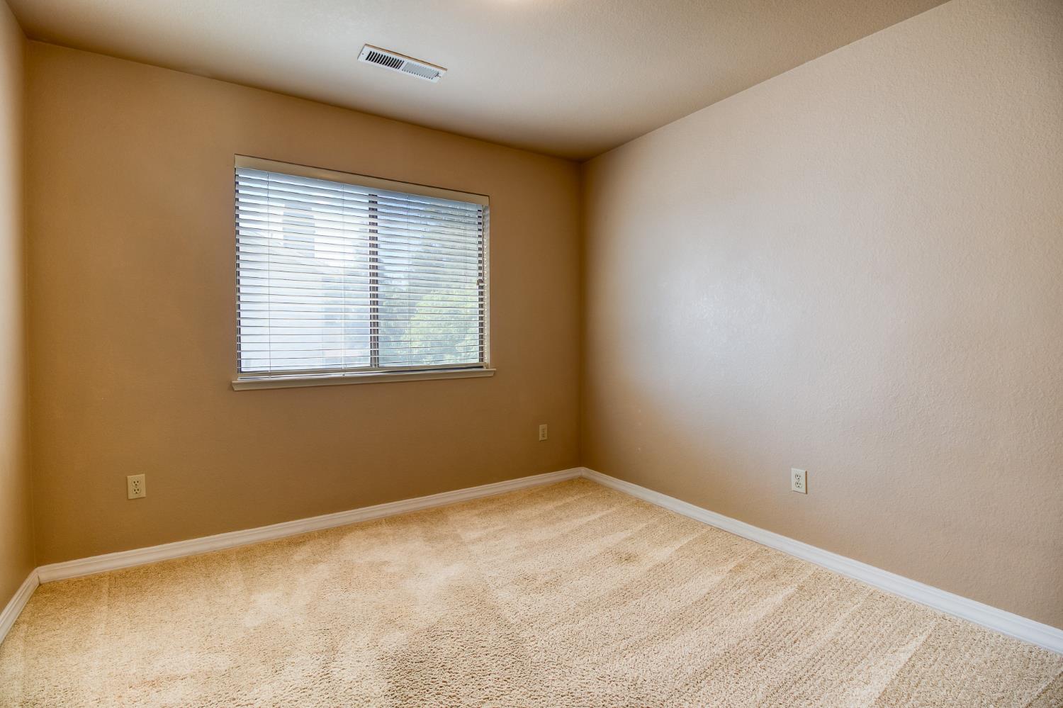 4209 Godfrey Drive Salida, CA 95368 - Photo 27 of 34 a view of an empty room with a window