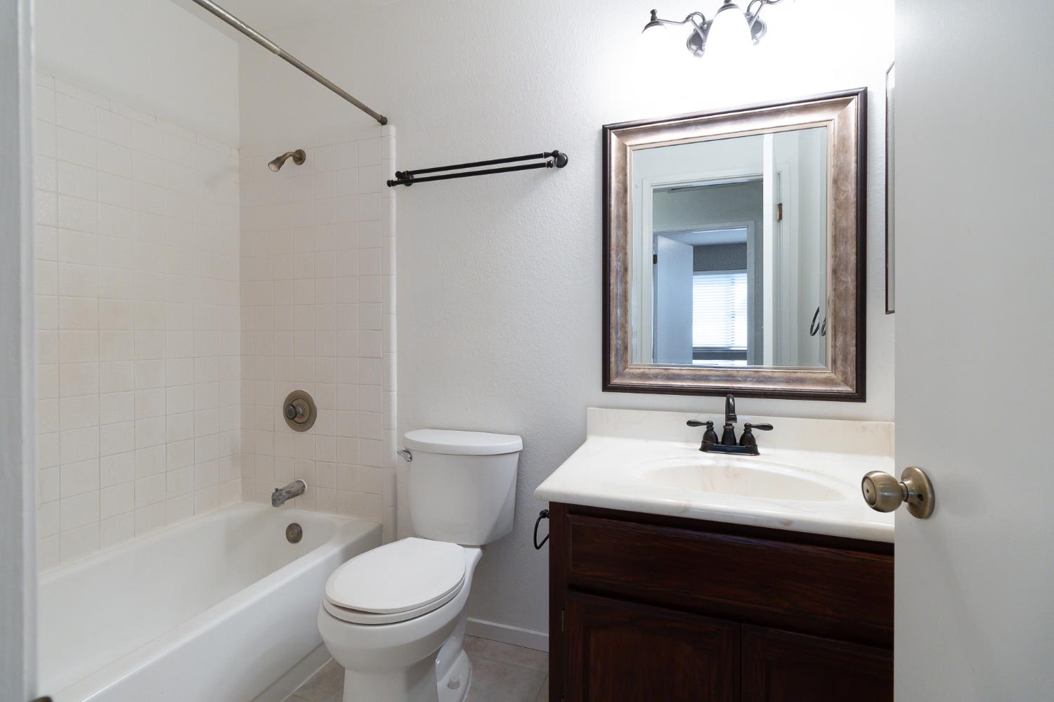 4209 Godfrey Drive Salida, CA 95368 - Photo 28 of 34 a bathroom with a sink toilet and shower
