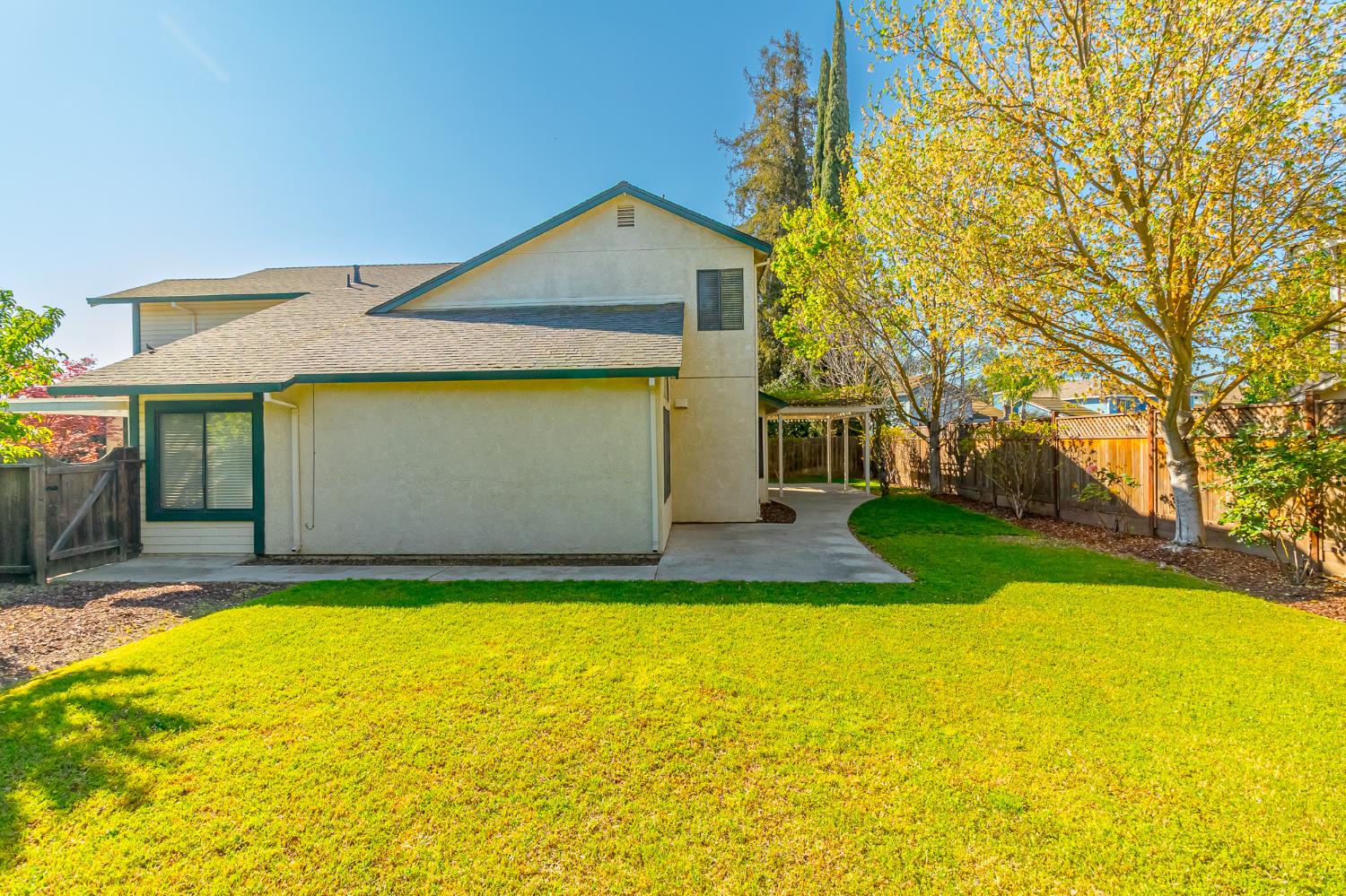 4209 Godfrey Drive Salida, CA 95368 - Photo 34 of 34 a view of a house with a yard and garage