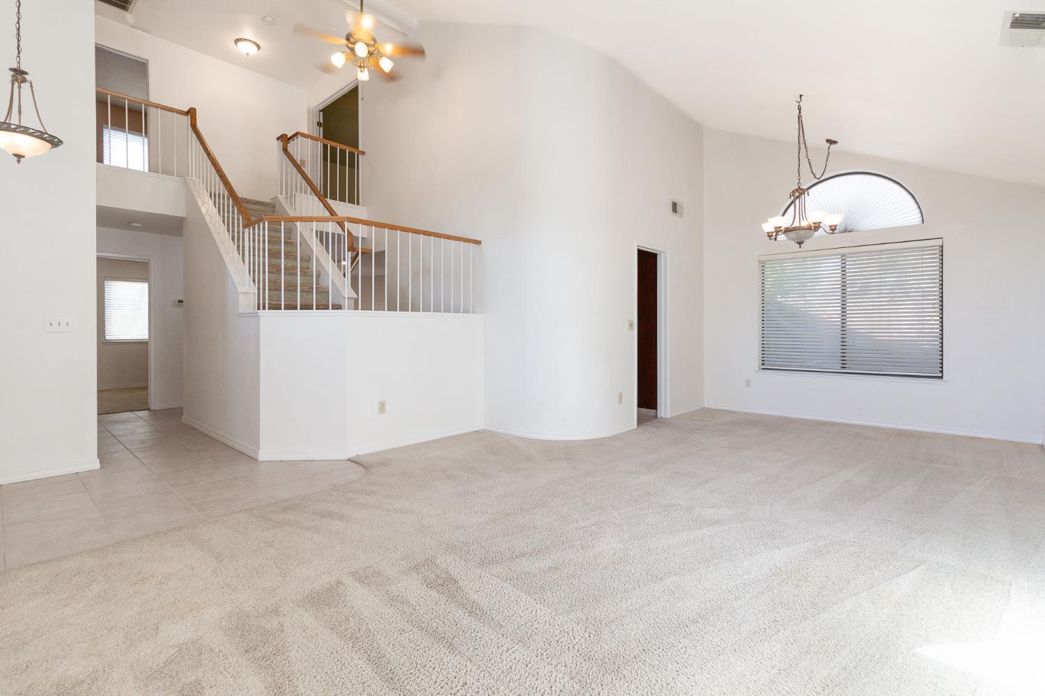 4209 Godfrey Drive Salida, CA 95368 - Photo 8 of 34 a view of an empty room with wooden floor and a window