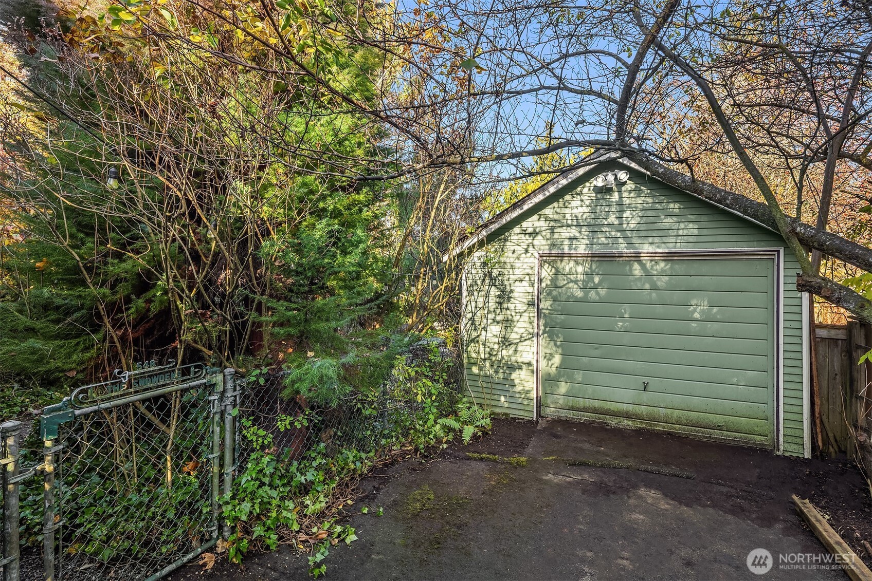 548 Northeast 102nd Street Seattle, WA 98125 - Photo 19 of 22 a view of a house with a small yard