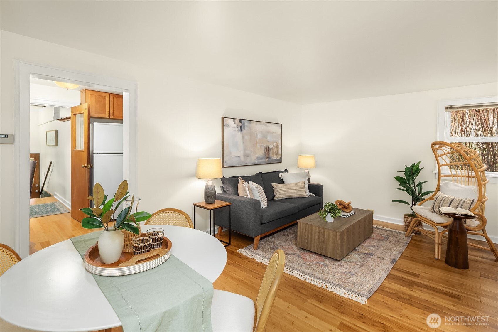 548 Northeast 102nd Street Seattle, WA 98125 - Photo 2 of 22 a living room with furniture and a potted plant