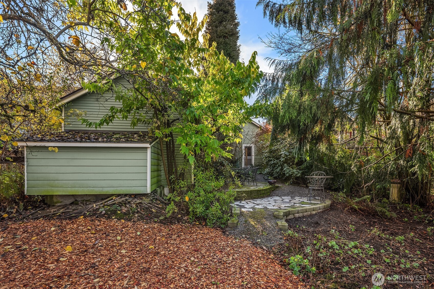 548 Northeast 102nd Street Seattle, WA 98125 - Photo 22 of 22 a view of a house with a tree