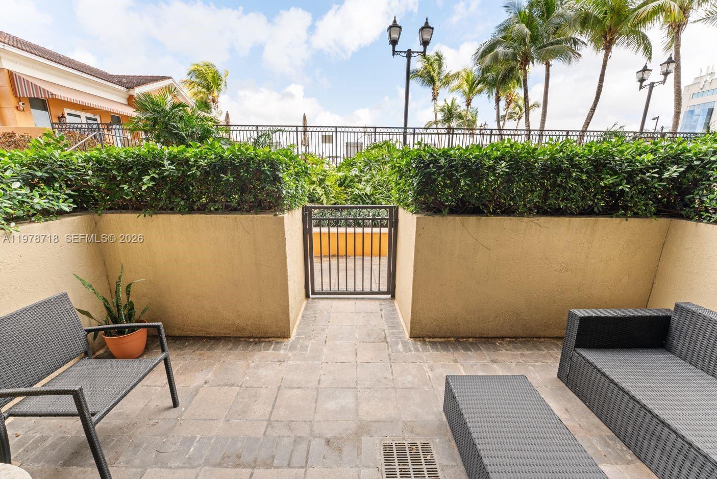 3232 Southwest 22nd Terrace, Unit 708 Miami, FL 33145 - Photo 20 of 28 The patio opens directly to the pool and amenities, giving you the feeling of living in a single-family home, with the pool right outside your balcony.