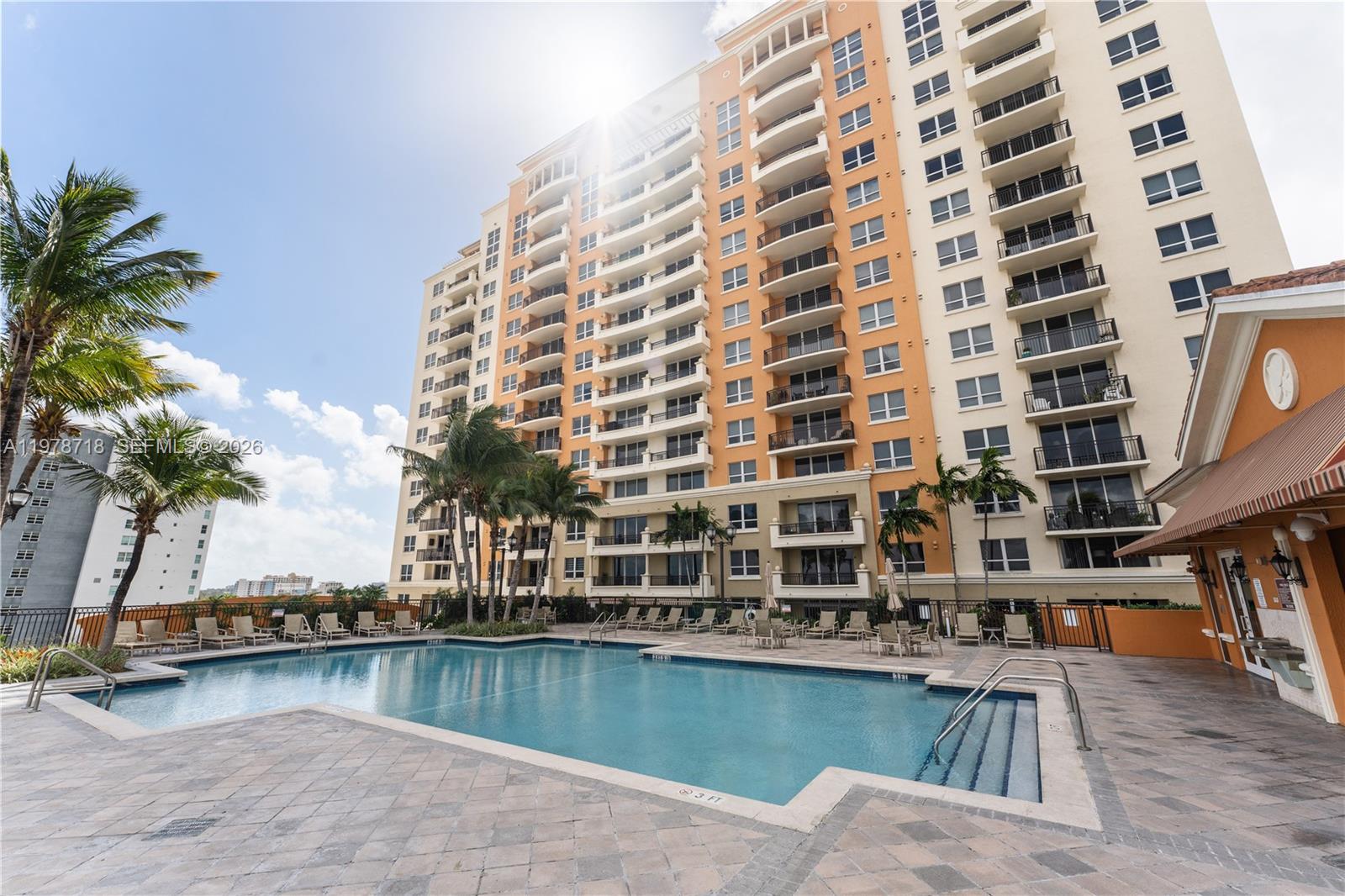 3232 Southwest 22nd Terrace, Unit 708 Miami, FL 33145 - Photo 28 of 28 The patio opens directly to the pool and amenities, giving you the feeling of living in a single-family home, with the pool right outside your balcony.