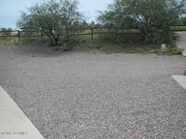 1171 Circulo Golfo Rio Rico, AZ 85648 - Photo 16 of 17 a backyard of a house with lots of green space
