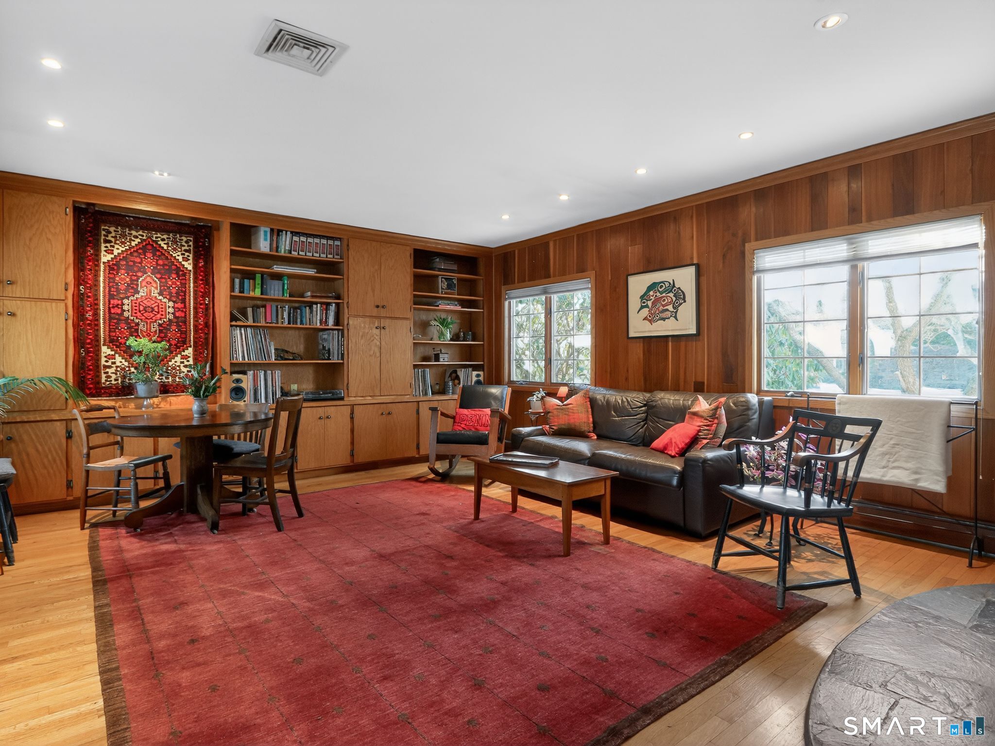 59 Broadfield Road Hamden, CT 06517 - Photo 11 of 40 a living room with furniture a rug and a large window