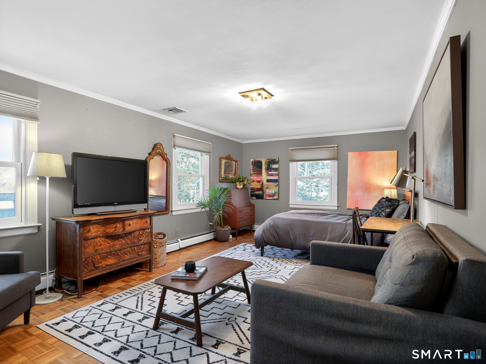 59 Broadfield Road Hamden, CT 06517 - Photo 17 of 40 a living room with furniture and a flat screen tv