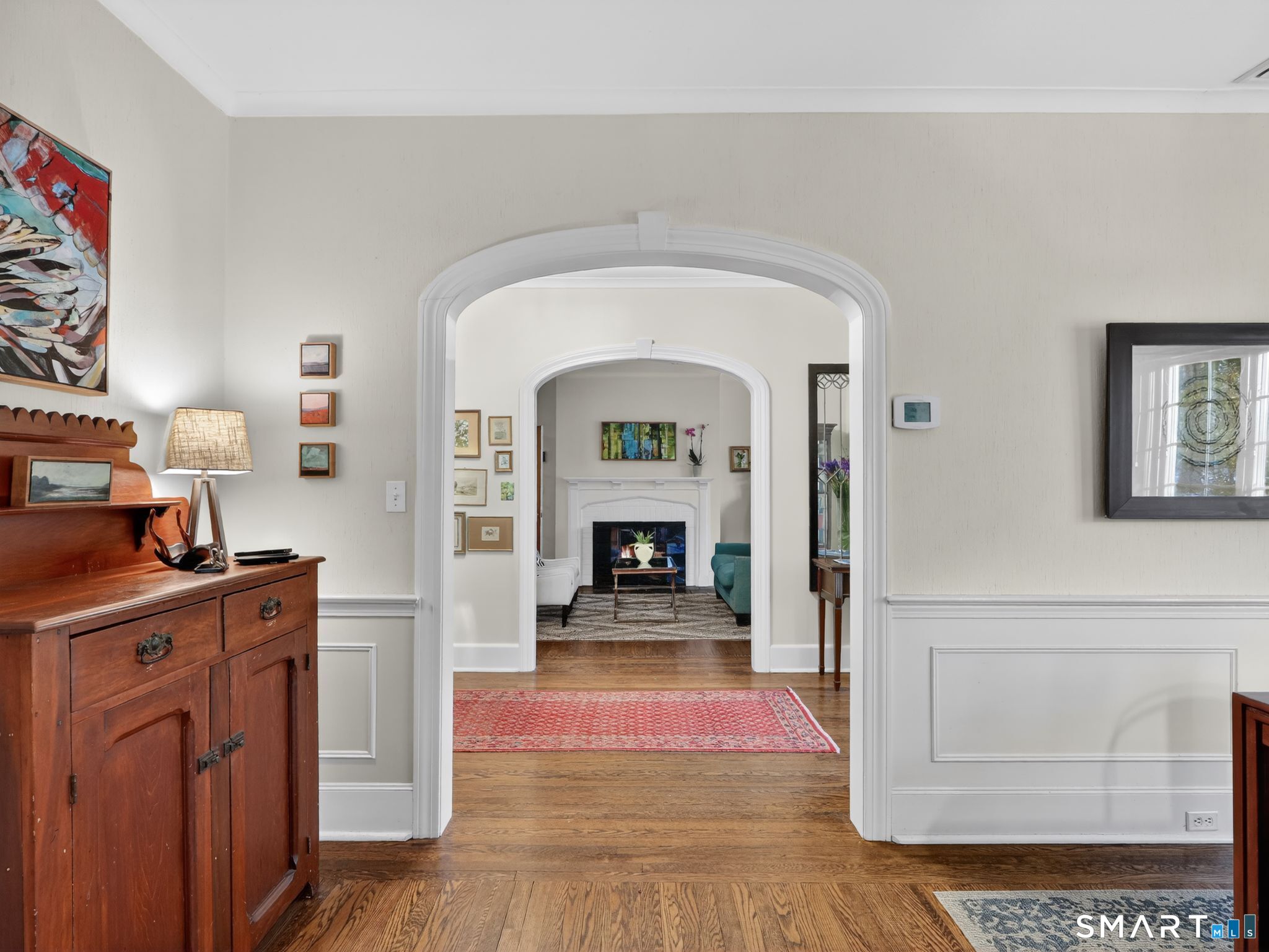 59 Broadfield Road Hamden, CT 06517 - Photo 20 of 40 a living room with furniture and a fireplace