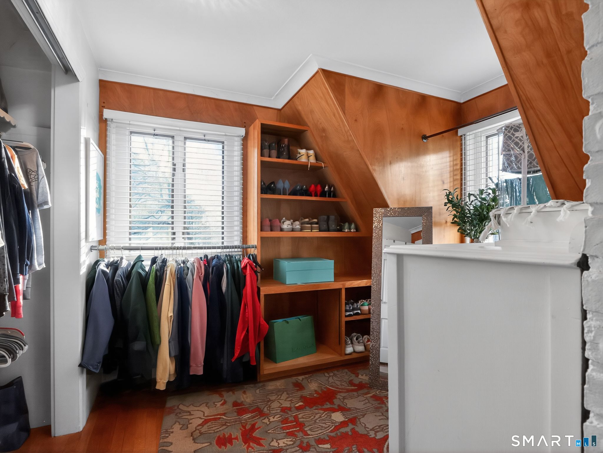 59 Broadfield Road Hamden, CT 06517 - Photo 22 of 40 a view of walk in closet with clothes and shoes