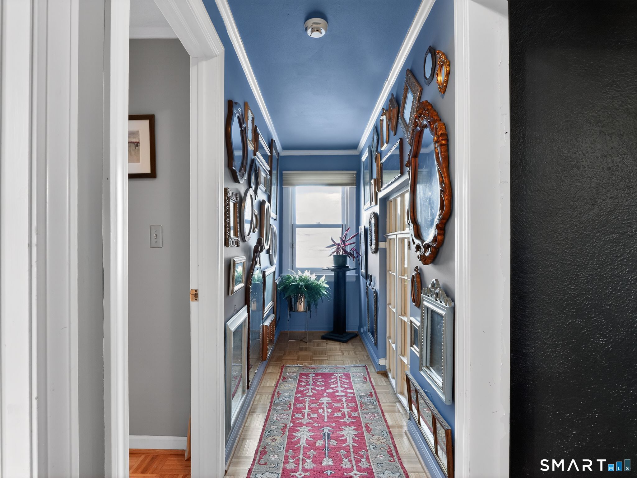 59 Broadfield Road Hamden, CT 06517 - Photo 25 of 40 a view of hallway with wooden floor and stairs