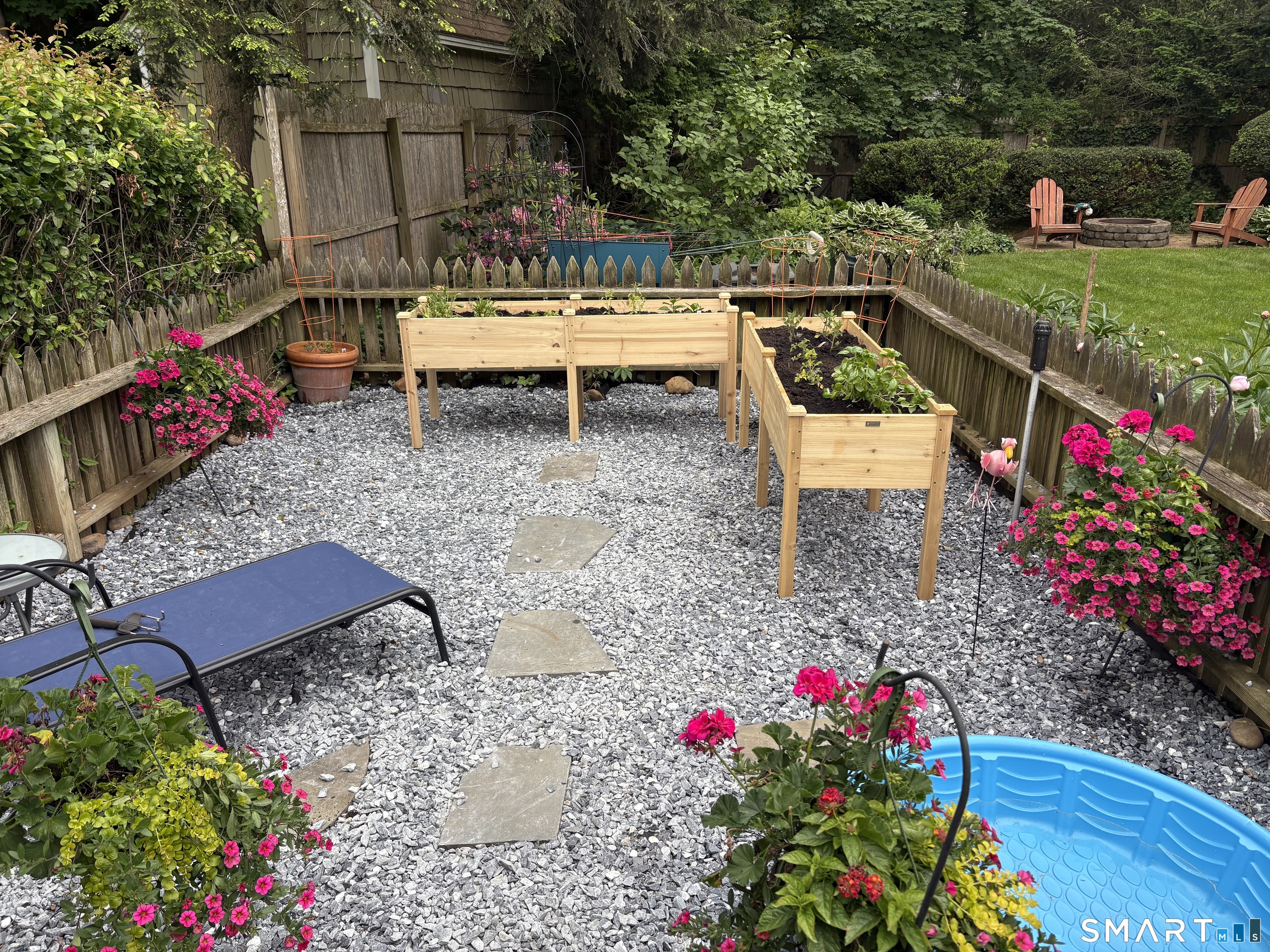 59 Broadfield Road Hamden, CT 06517 - Photo 40 of 40 a view of a chairs and table in the garden