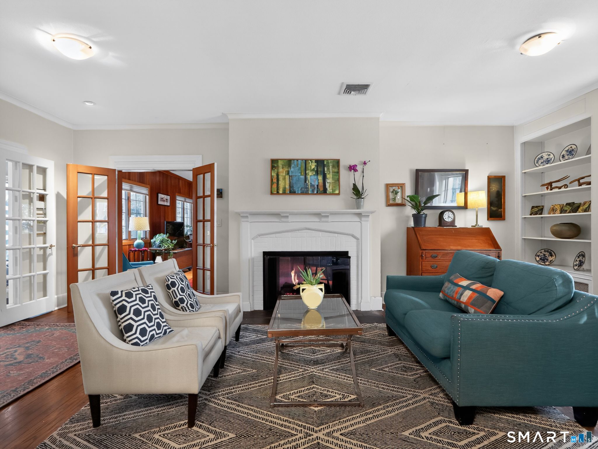 59 Broadfield Road Hamden, CT 06517 - Photo 4 of 40 a living room with furniture and a fireplace