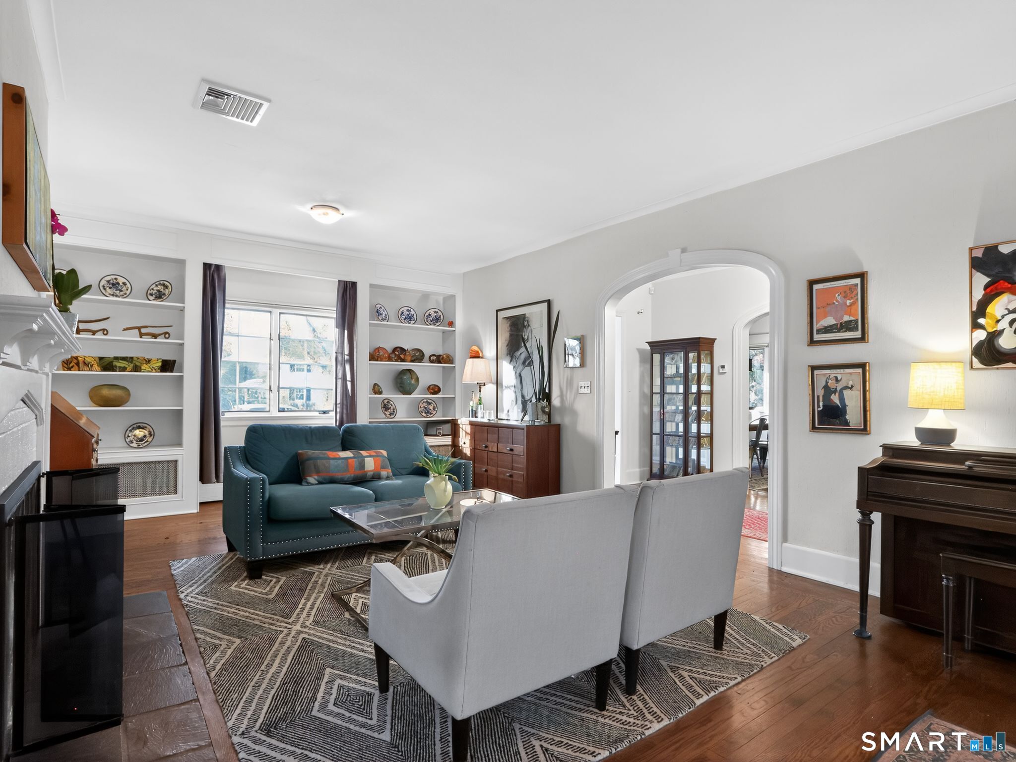59 Broadfield Road Hamden, CT 06517 - Photo 5 of 40 a living room with furniture and wooden floor
