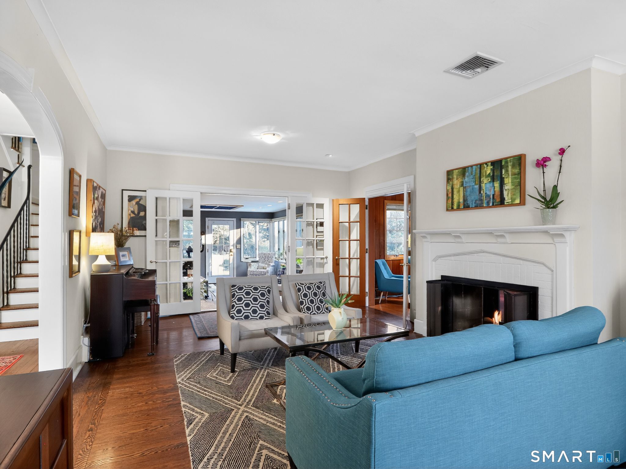 59 Broadfield Road Hamden, CT 06517 - Photo 6 of 40 a living room with furniture and a fireplace