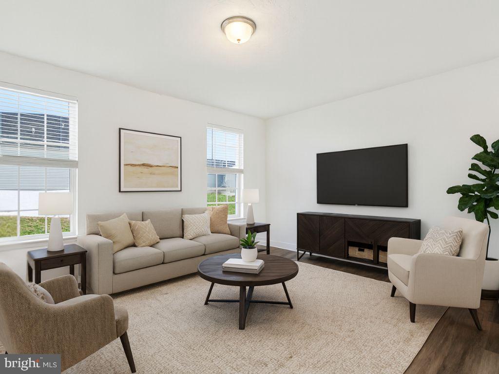 1508 Falcon Lane, Unit 252 Chambersburg, PA 17202 - Photo 5 of 12 a living room with furniture and a flat screen tv