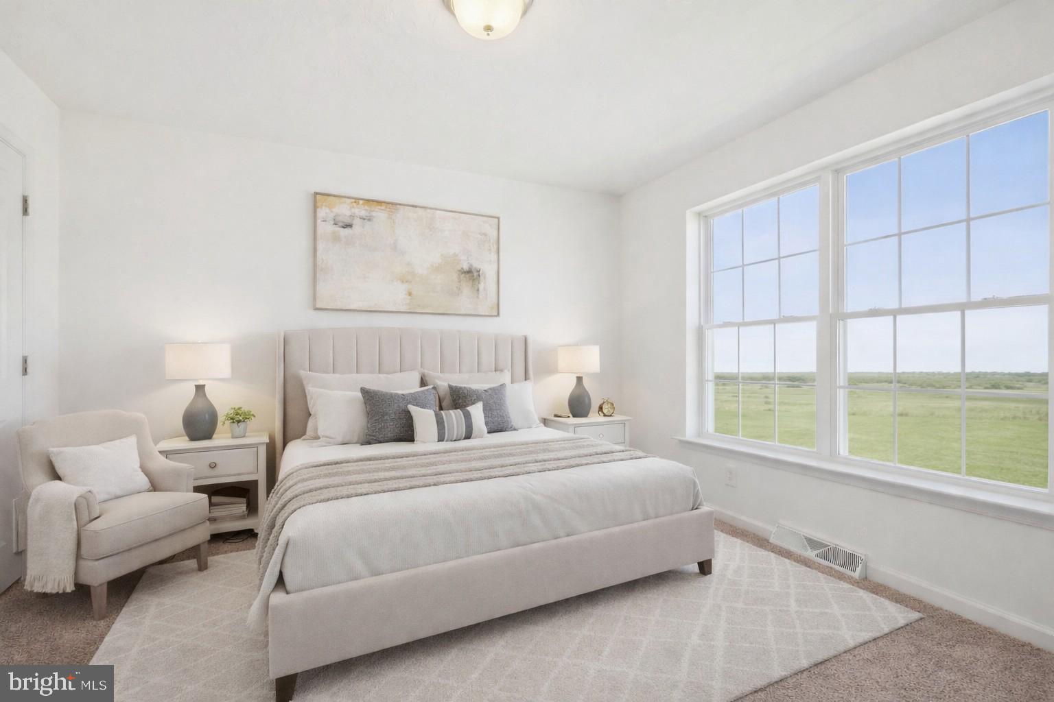 1508 Falcon Lane, Unit 252 Chambersburg, PA 17202 - Photo 8 of 12 a bedroom with a bed and a large window