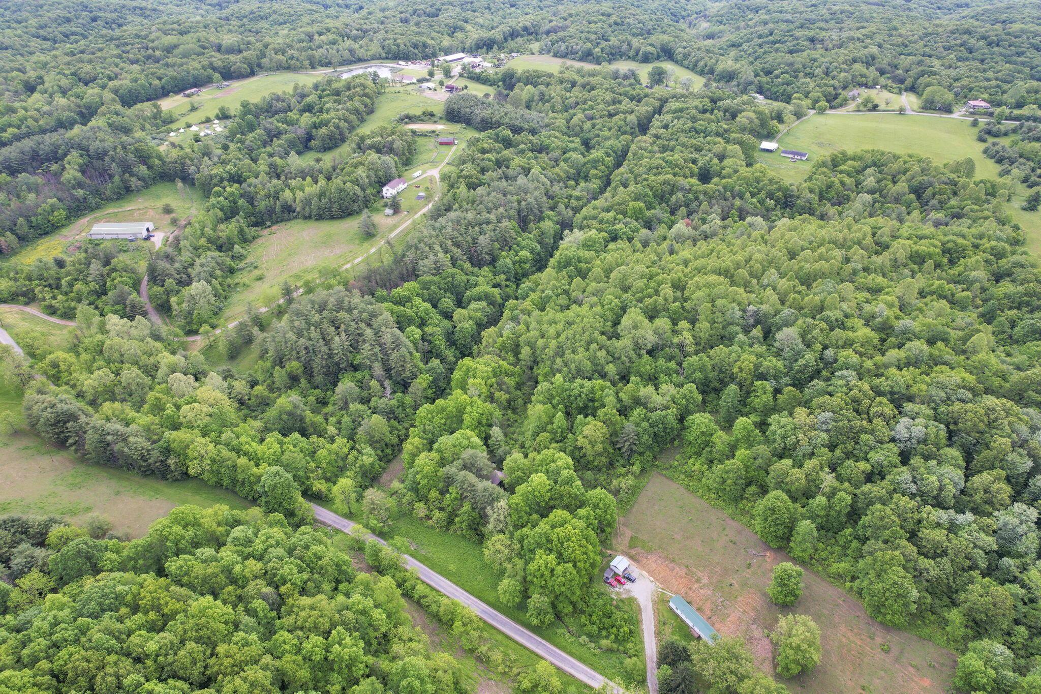 11250 Grass Run Road New Marshfield, OH 45766 - Photo 1 of 16 Surrounded by Nature