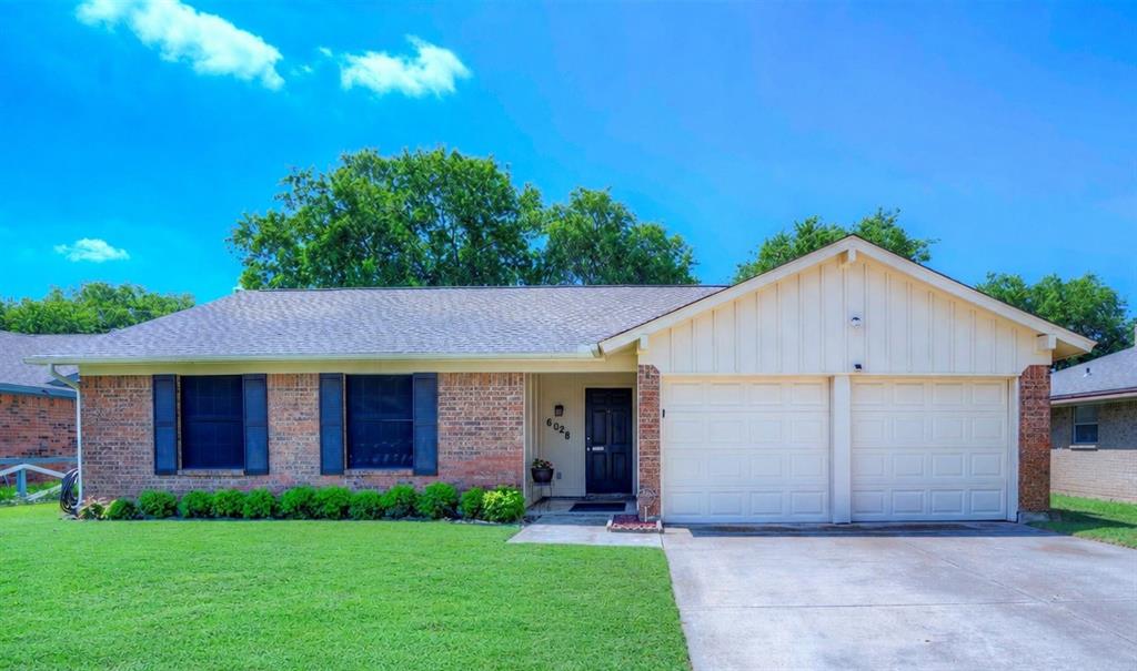 6028 Ridgecrest Drive Watauga, TX 76148 - Photo 1 of 40 a view of a house with a yard