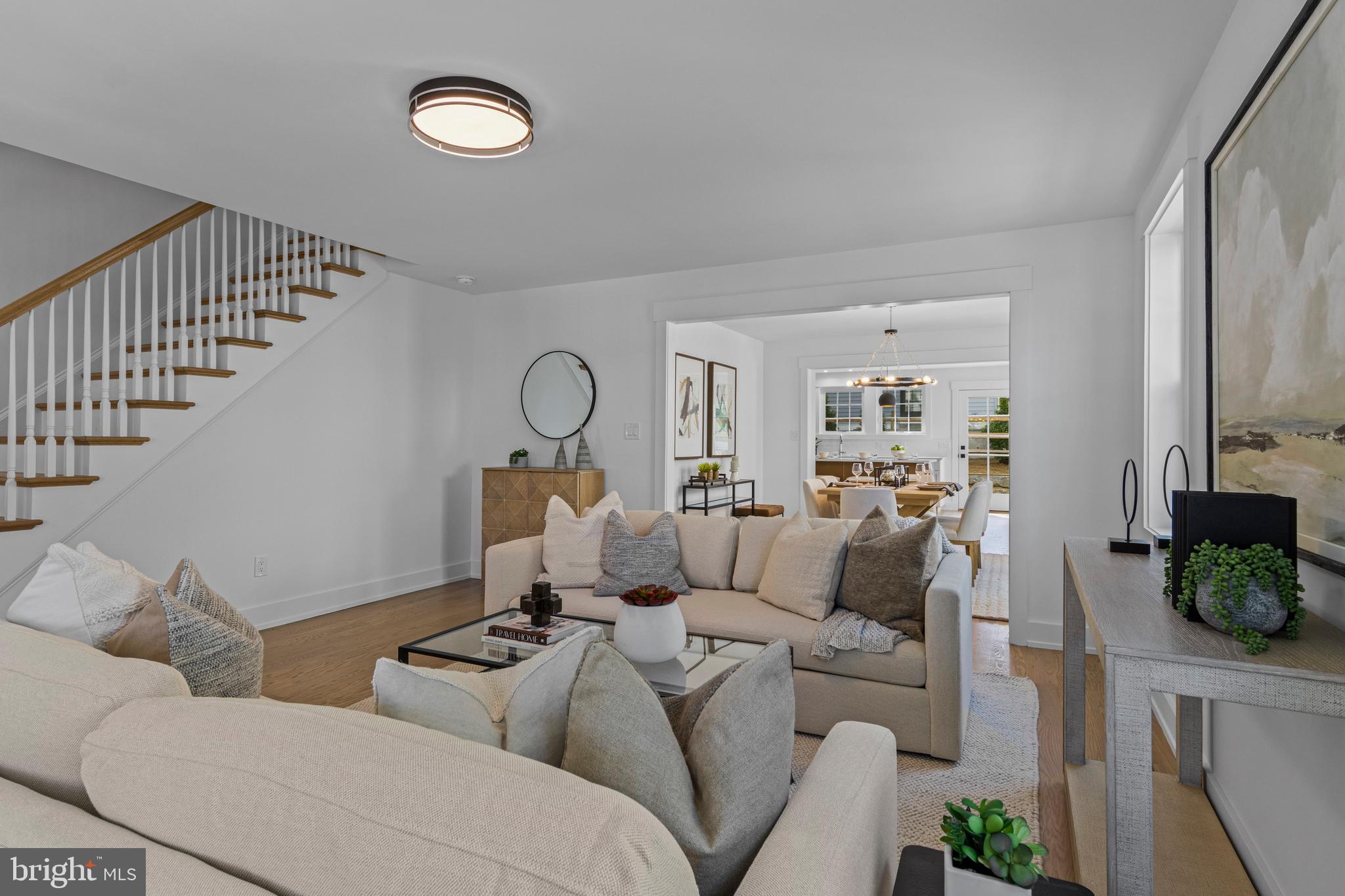 142 Merion Avenue Narberth, PA 19072 - Photo 14 of 67 a living room with furniture and a clock
