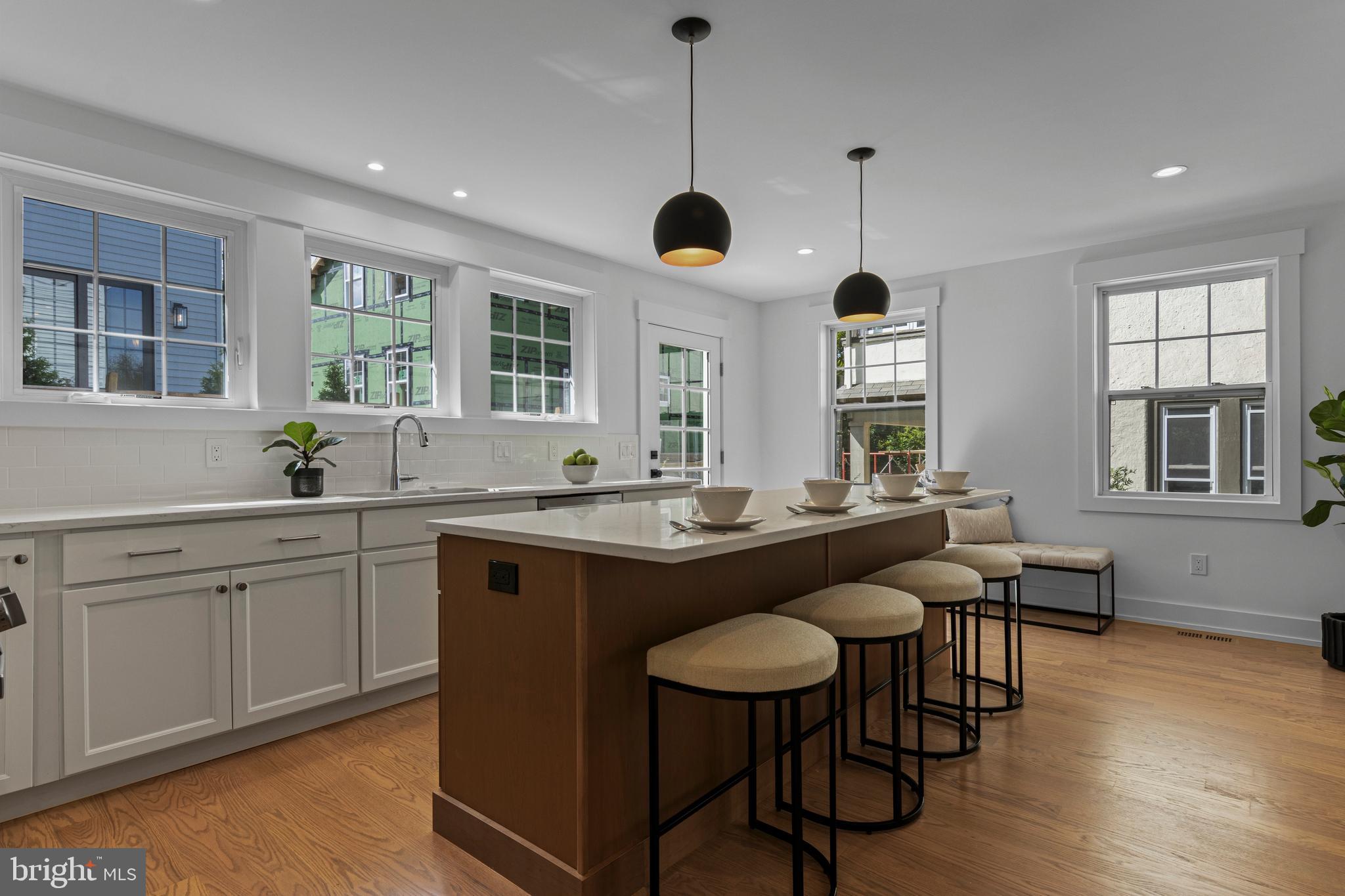 142 Merion Avenue Narberth, PA 19072 - Photo 25 of 67 a view of a kitchen area with furniture window and wooden floor
