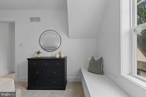 an aerial view of residential house with outdoor space and parking