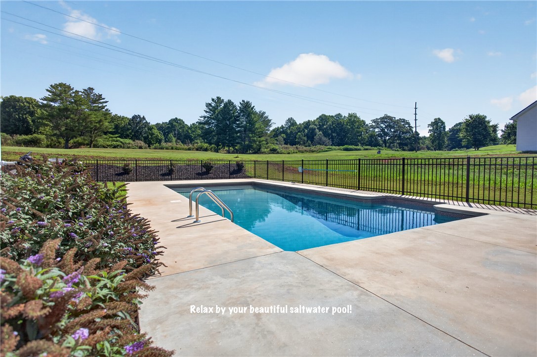 2007 Aberdeen Lane Walhalla, SC 29691 - Photo 30 of 41 A tranquil inground pool with concrete decking offers refreshing outdoor living.