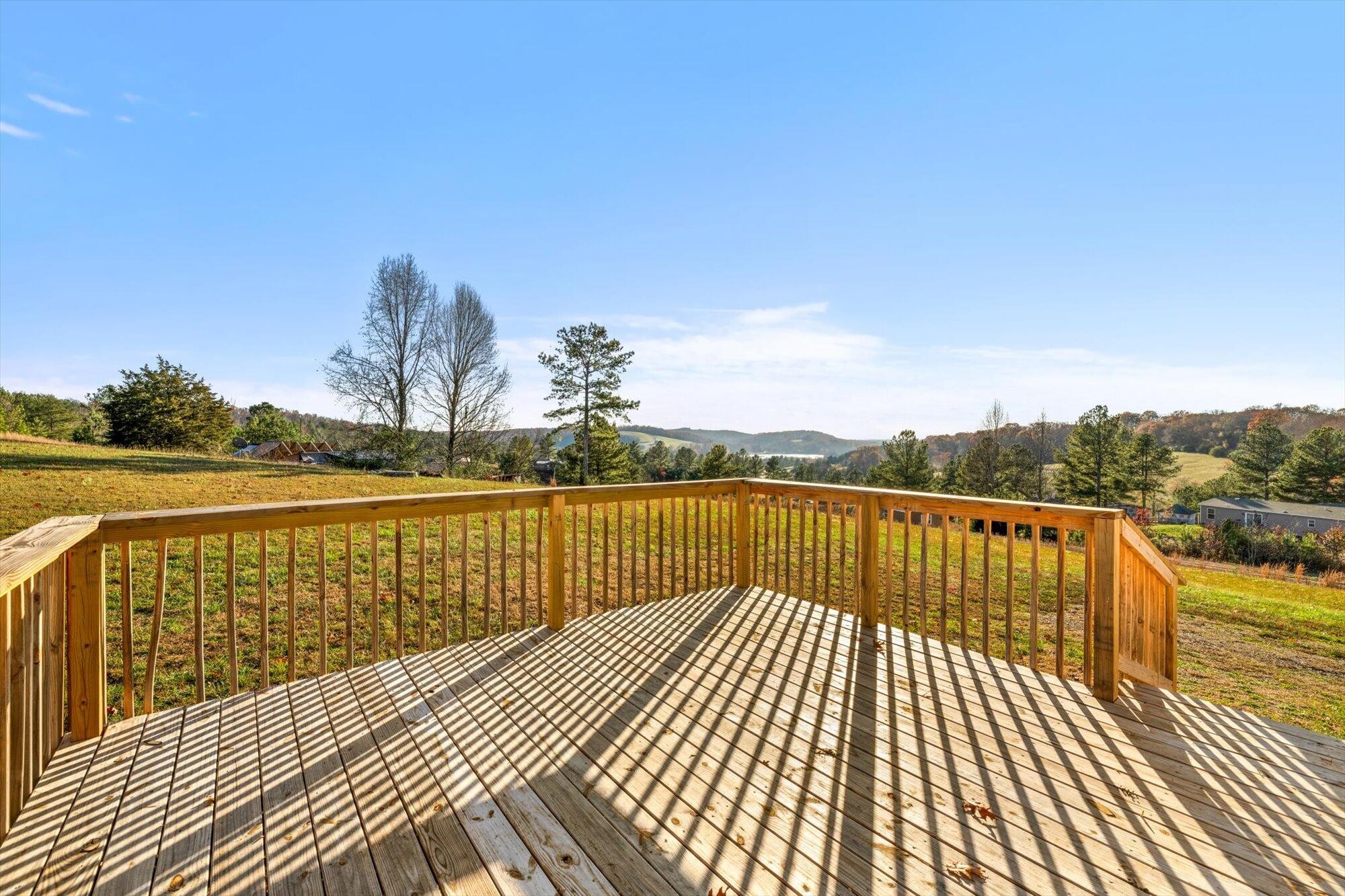 1202 Green Pond Road Decatur, TN 37322 - Photo 27 of 28 a view of balcony with wooden floor and lake view