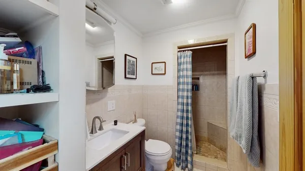 a view of a balcony with chairs