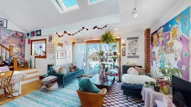 a kitchen with stainless steel appliances granite countertop sink refrigerator and microwave