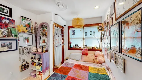 a bedroom with a bed and furniture