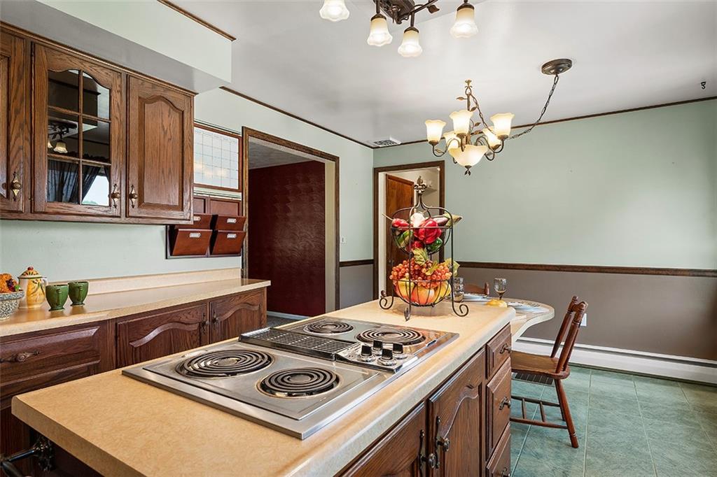 632 Sandy Hill Road Valencia, PA 16059 - Photo 12 of 48 a kitchen with a table and chairs in it