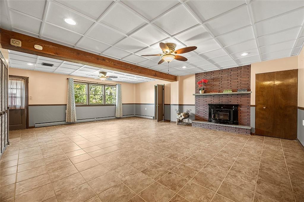 632 Sandy Hill Road Valencia, PA 16059 - Photo 28 of 48 a view of an empty room with a fireplace